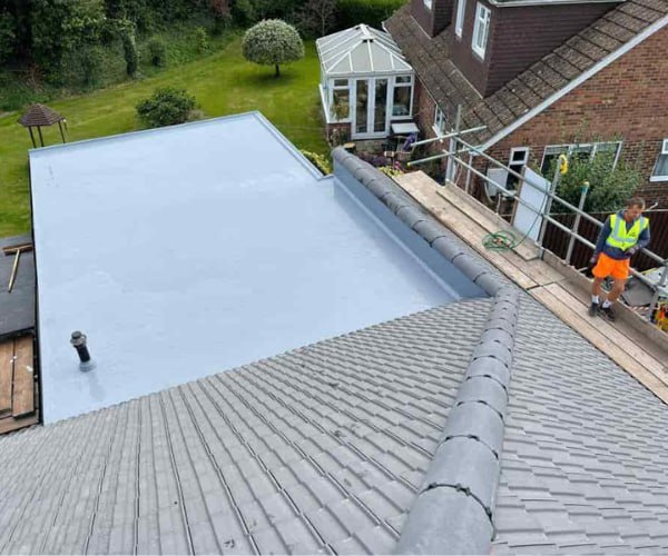 This is a photo of a newly installed hip roof, with a combined liquid covered flat roof. Work carried out by BN Roofing Letchworth Garden City