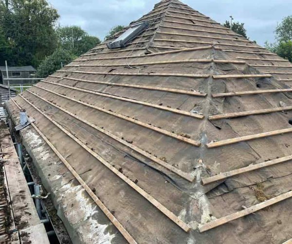 This is a photo of a hip roof that has been stripped back to the battens, and is awaiting a new roof covering to be installed. Works carried out by BN Roofing Letchworth Garden City